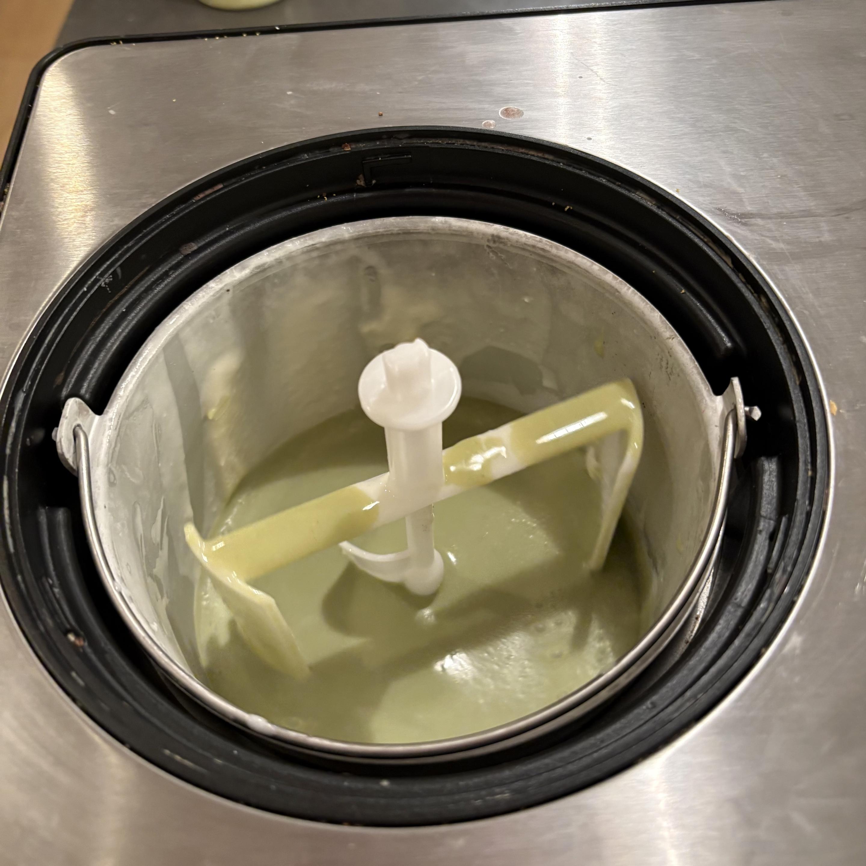 Matcha ice cream looking very green in the ice cream maker