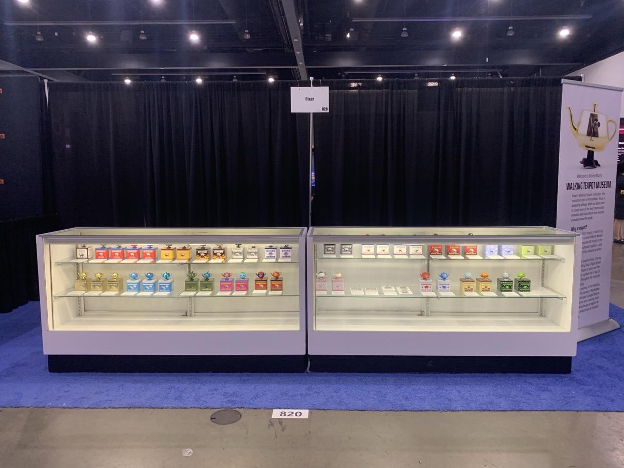 Pixar's booth at SIGGRAPH with walking teapots.